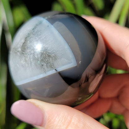 Black Onyx Sphere With Quartz: Grounded Elegance and Clear Energies