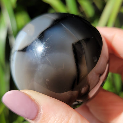 Black Onyx Sphere With Quartz: Grounded Elegance and Clear Energies