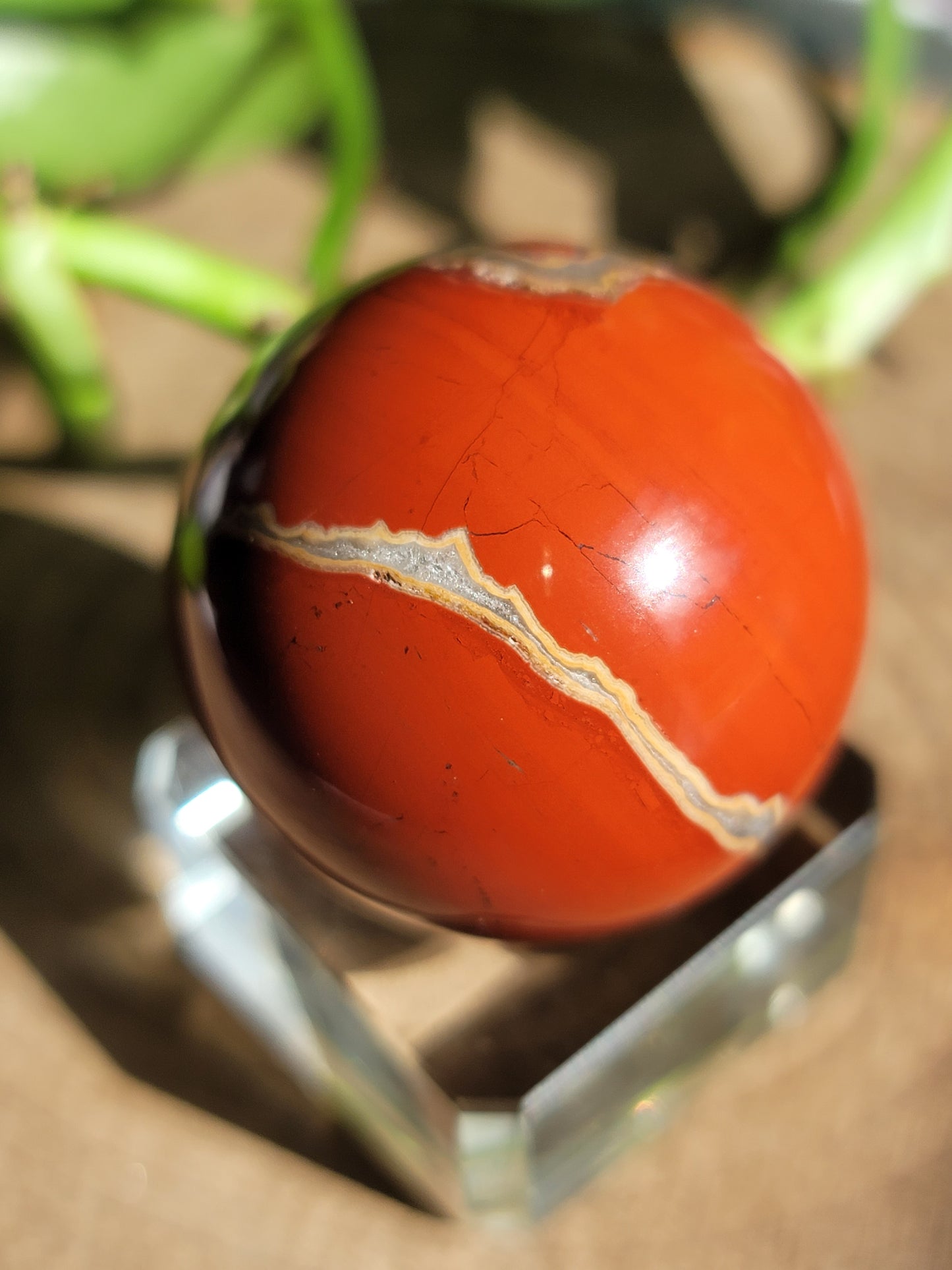 Red Jasper Sphere: Grounding Strength and Vitality