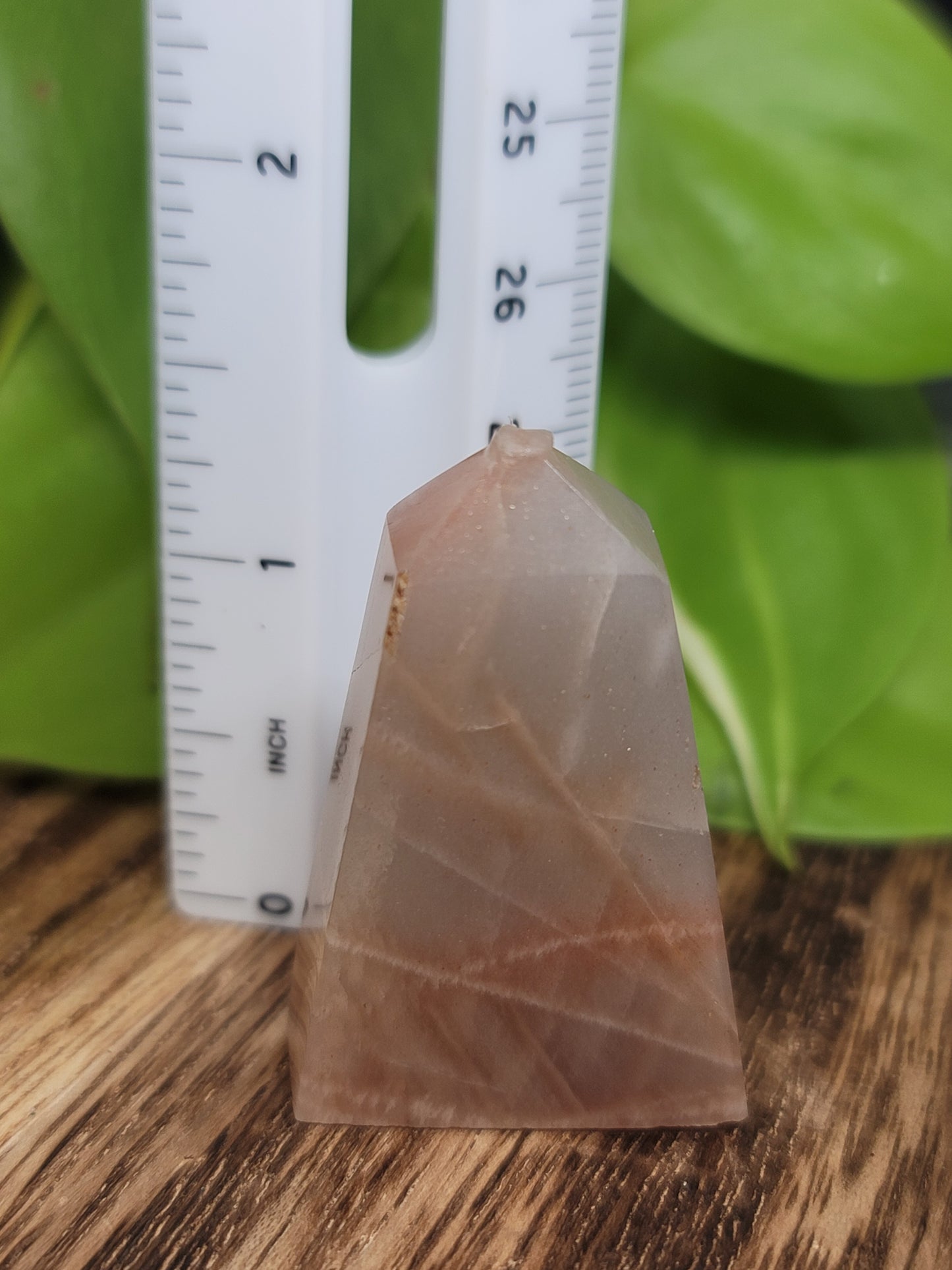 Peach Moonstone Sunstone Point: Radiant Joy and Inner Glow