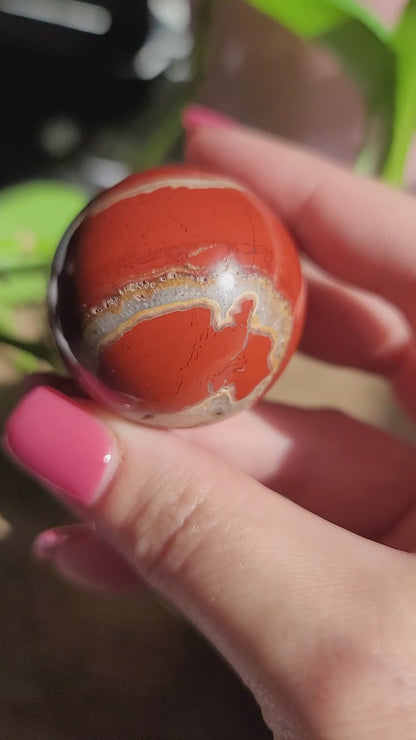 Red Jasper Sphere: Grounding Strength and Vitality